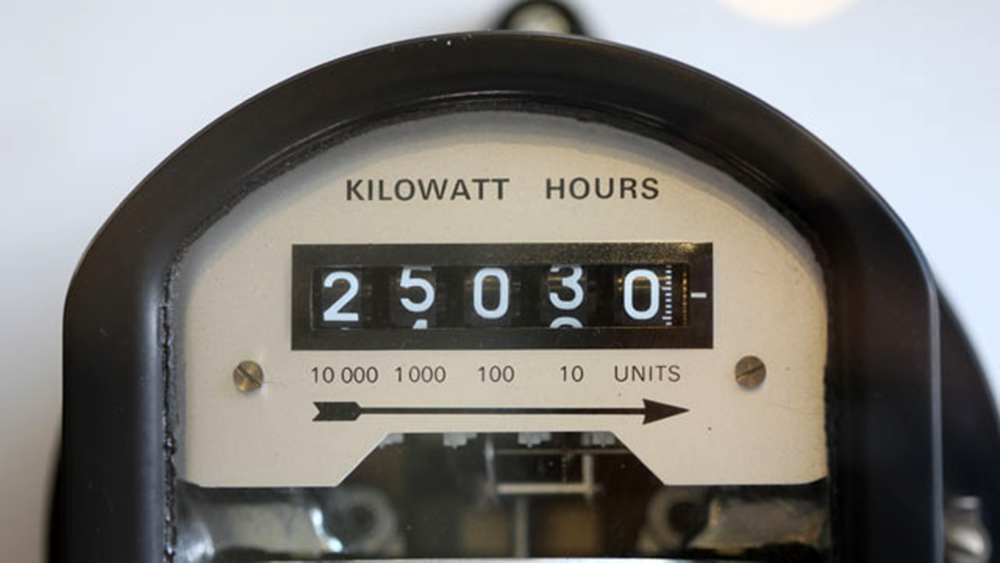 An electricity meter with a cyclometer display.